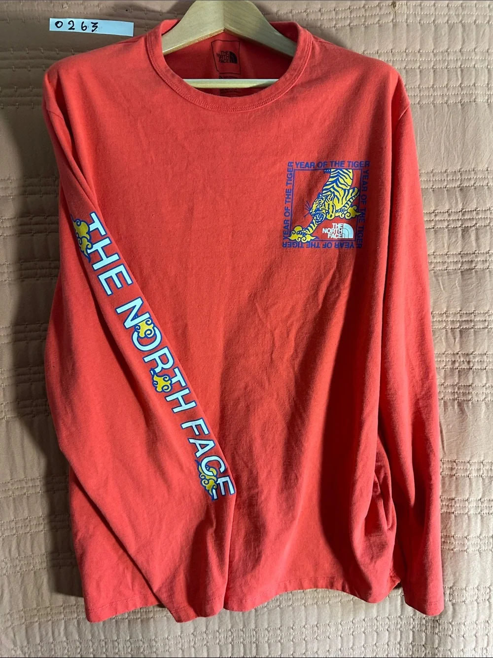The North Face Men's Long Sleeve Orange Graphic Tee with Sleeve Logo